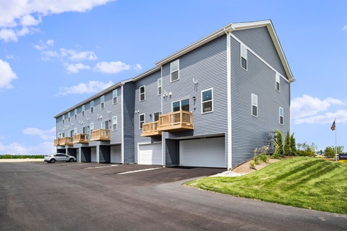 exterior townhome photo with balcony