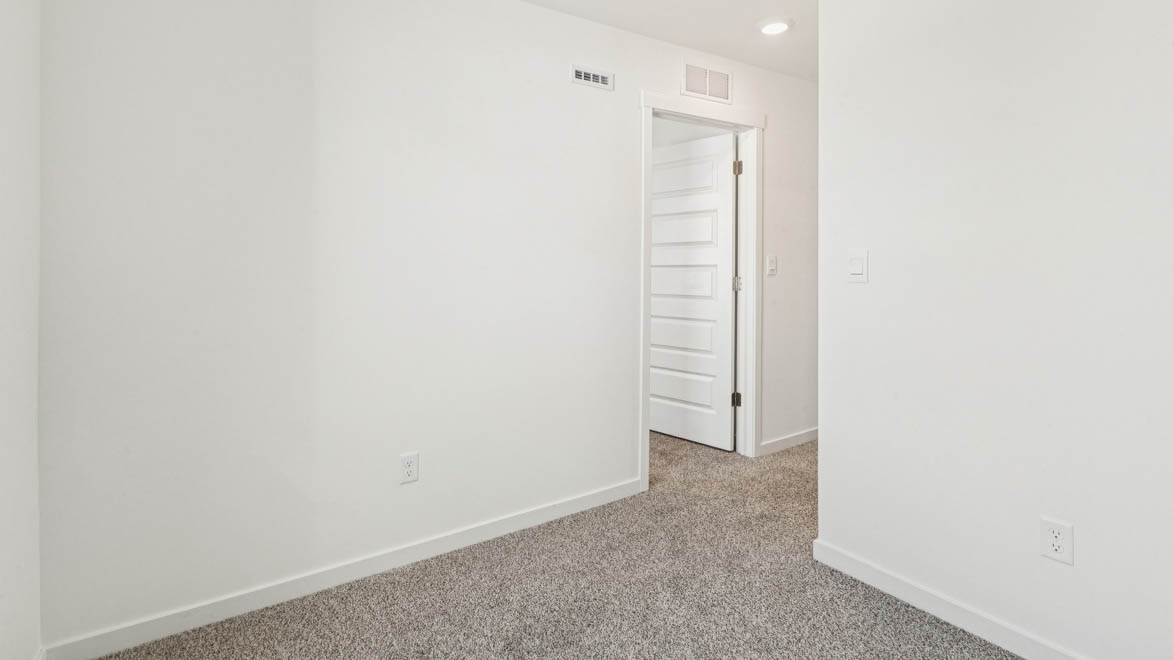 Hallway leading to loft and bedroom
