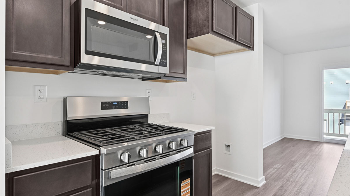 Kitchen with lower and upper cabinets