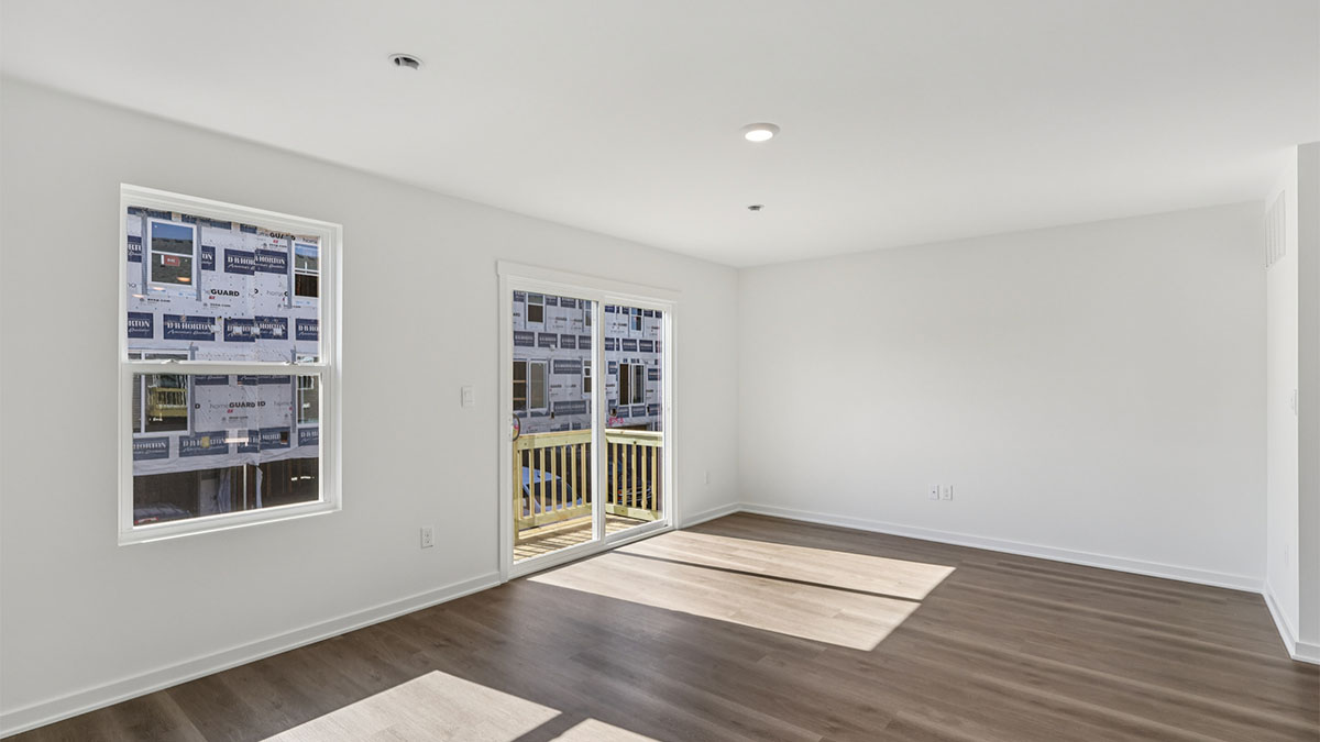 Great room with sliding door to balcony