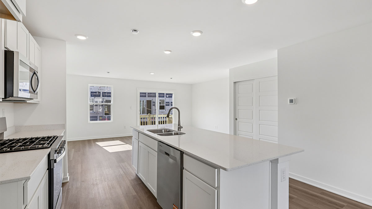 Huge kitchen island with sink and dishwasher
