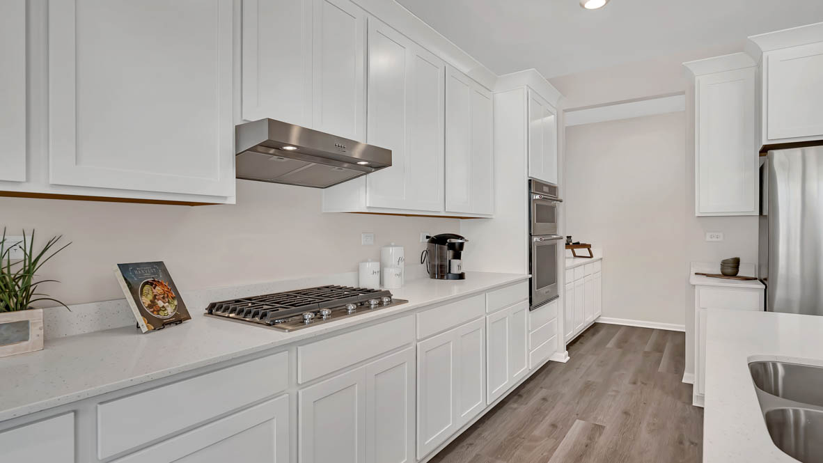 Kitchen with stainless steel appliances, 42 inch cabinets and soft close drawers