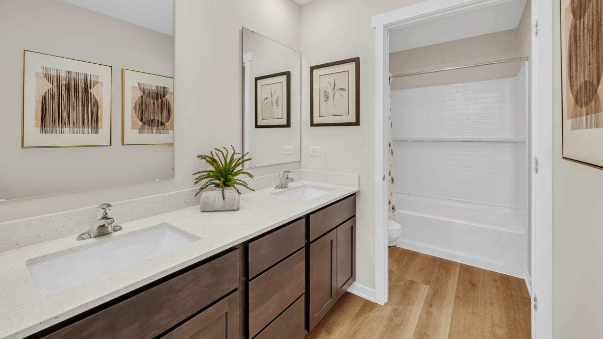 Upstairs full Bathroom with dual sinks and water closet