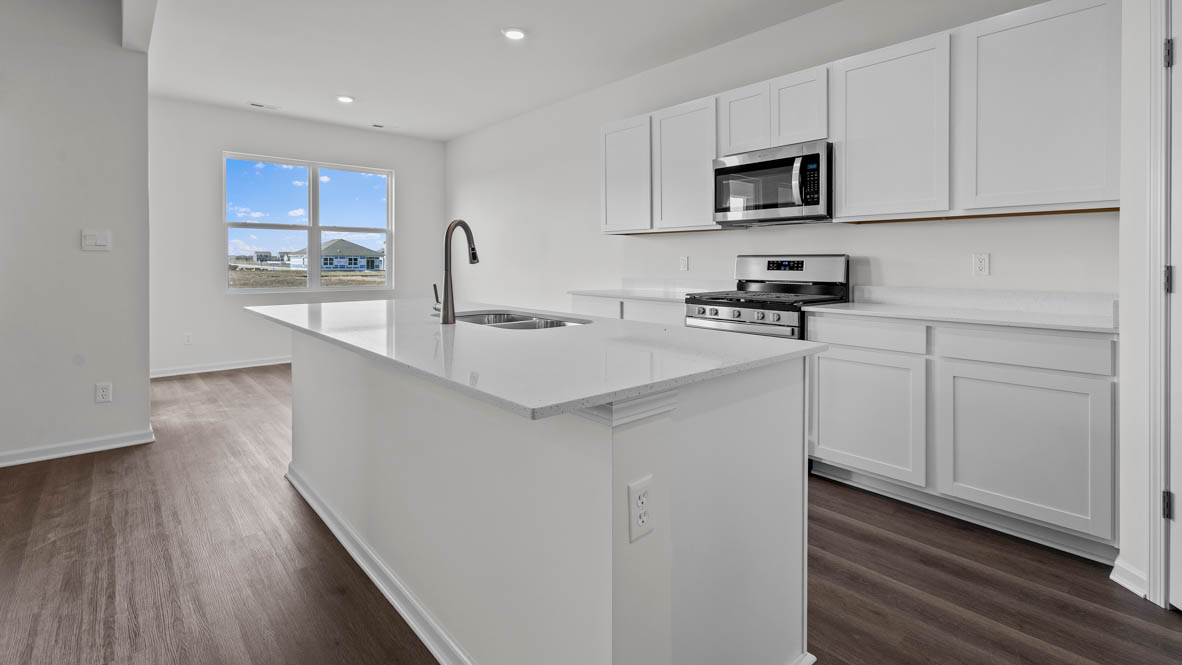 Large kitchen island with sink and dishwasher