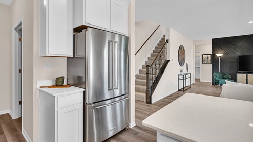 Kitchen with stainless steel appliances, 42 inch cabinets and soft close drawers