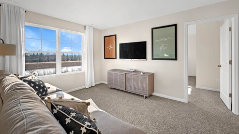 Loft with carpeting throughout