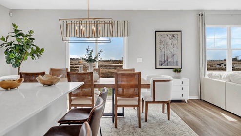 Dining room seating 6 chairs around