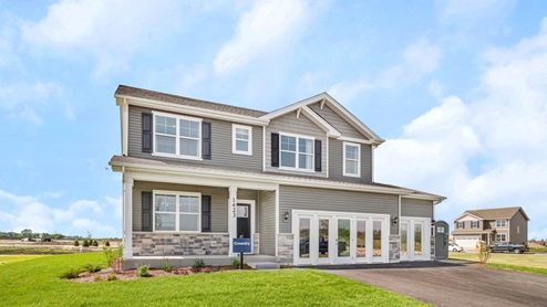Coventry model with grey vinyl siding and stone accent