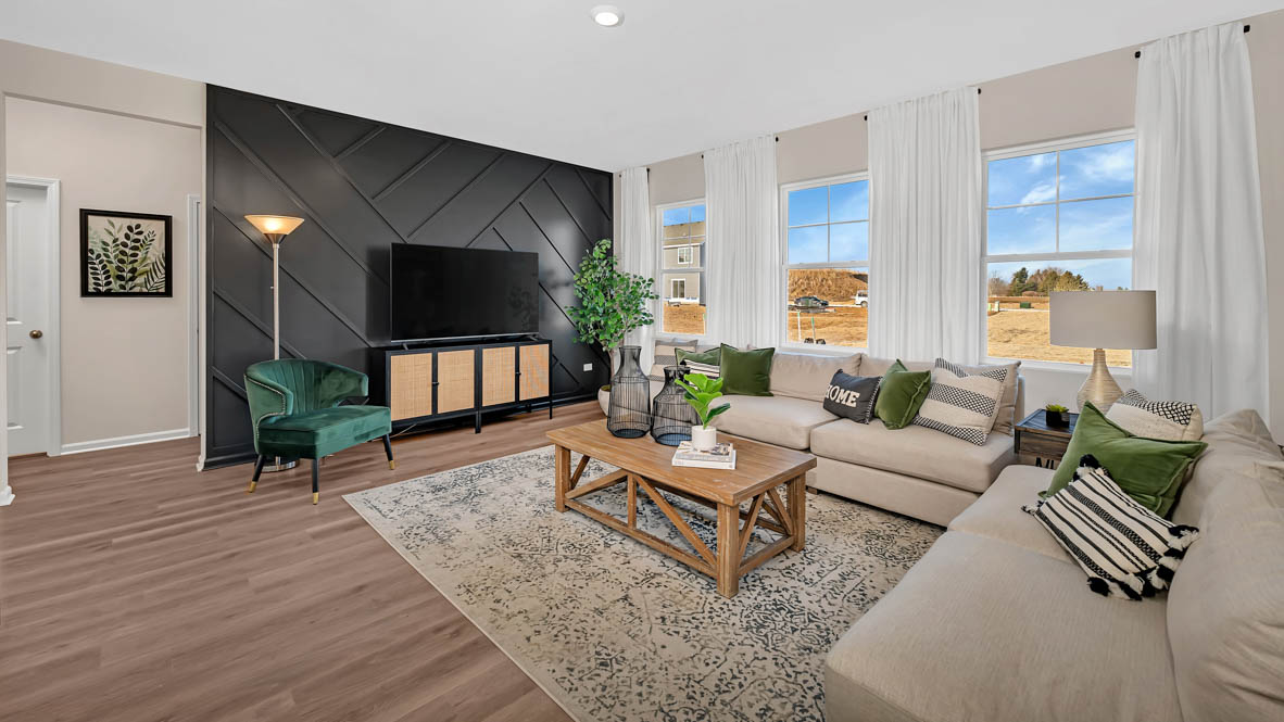 Great room with three windows to let in lots of natural light