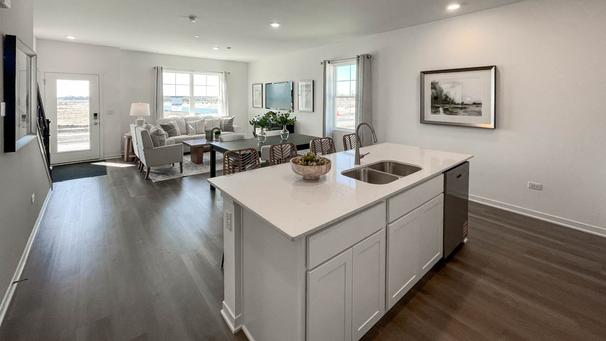 Large kitchen island with overhang, sink and dishwasher
