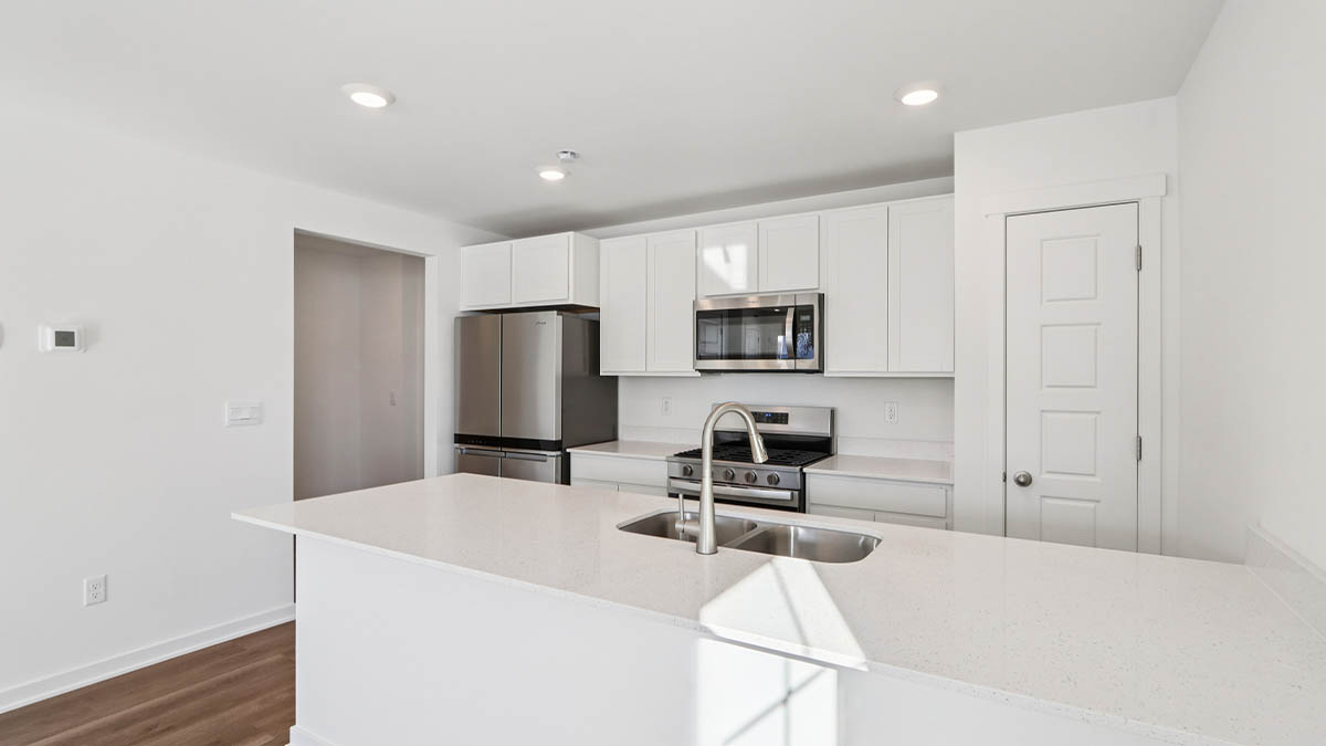 kitchen with white cabinets