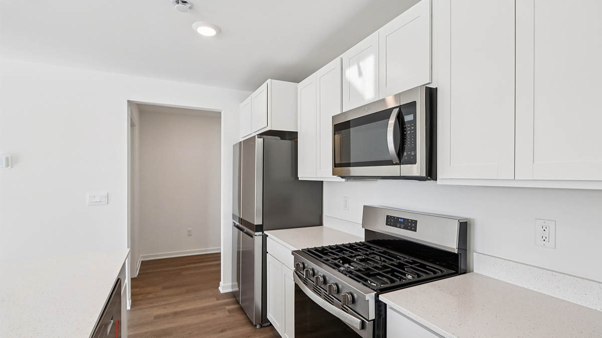 kitchen with white cabinets and stainless steel appliances