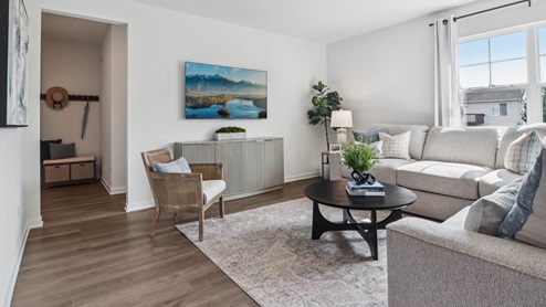 spacious great room leading to garage entry