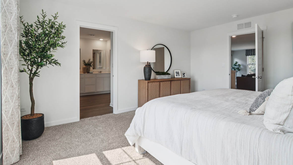 Primary bedroom with connecting en suite