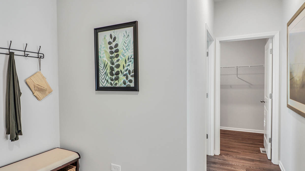 garage entry hallway with nook perfect for coats or shoes