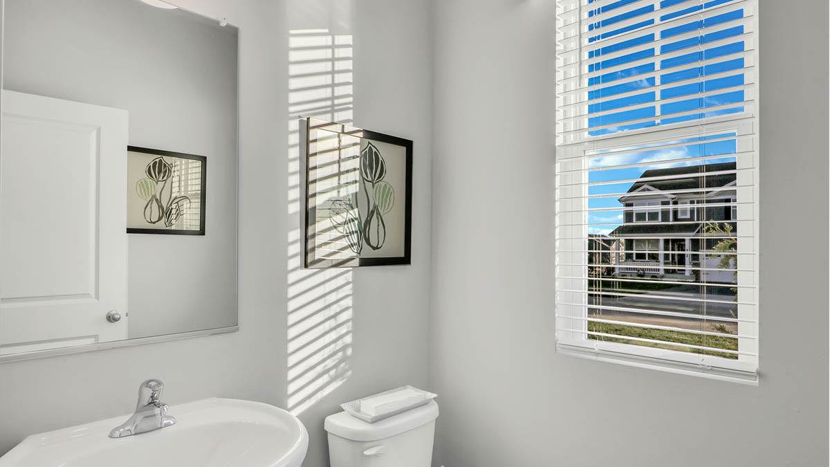 Powder room off of garage entrance