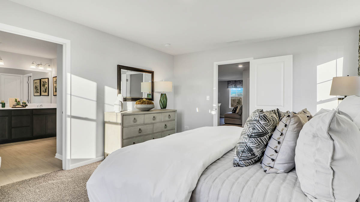 Primary bedroom with connecting en suite