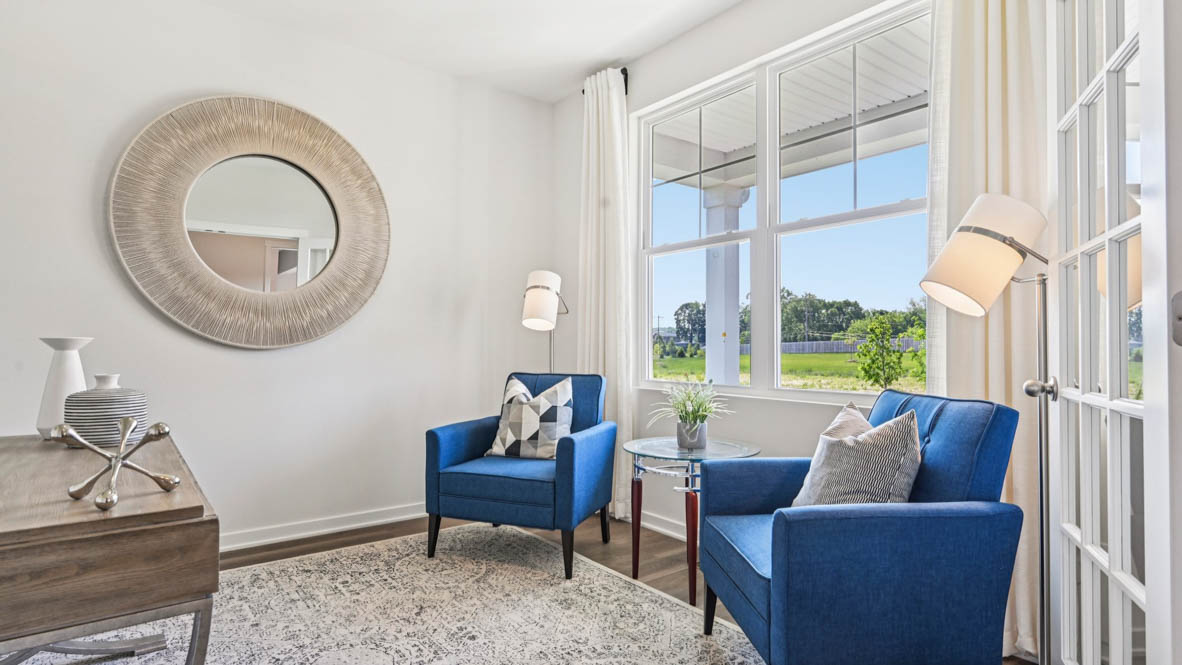 Flex room off of entrance with white French doors