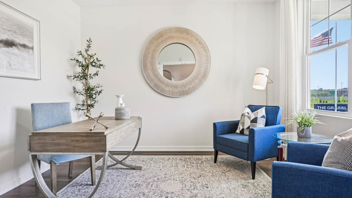 Flex room off of entrance with white French doors