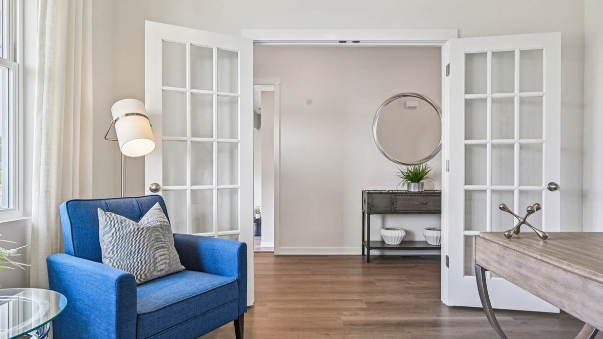 Flex room off of entrance with white French doors