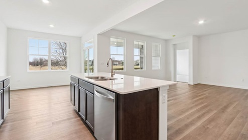 kitchen island with sink and dishwasher