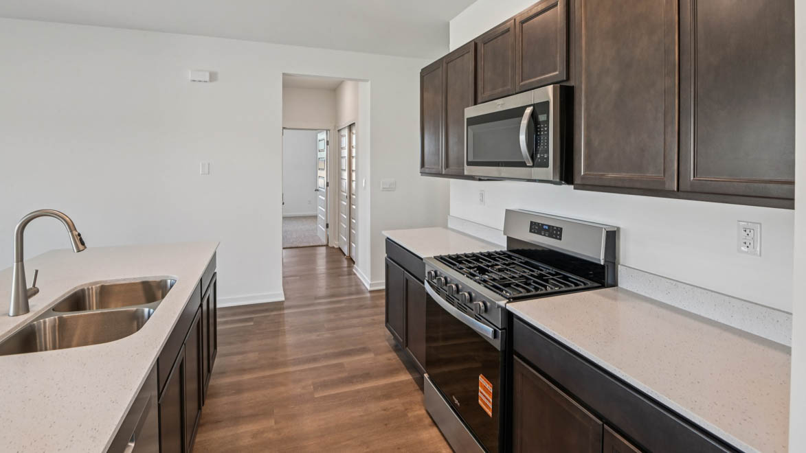 kitchen island with sink and dishwasher