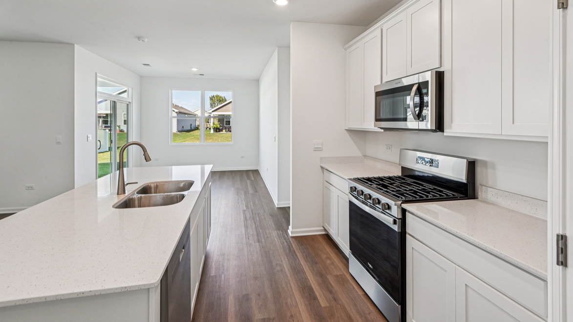 Kitchen with large island overlooking great room