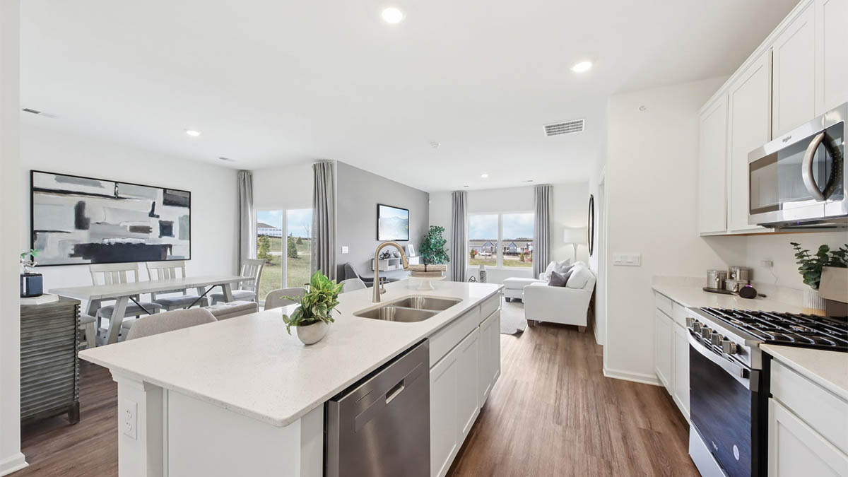 open concept kitchen with stainless steel appliances