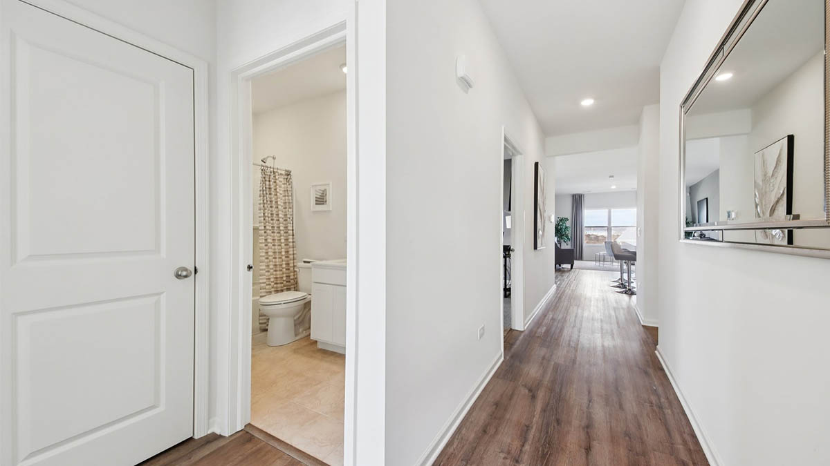 hallway with secondary full bathroom