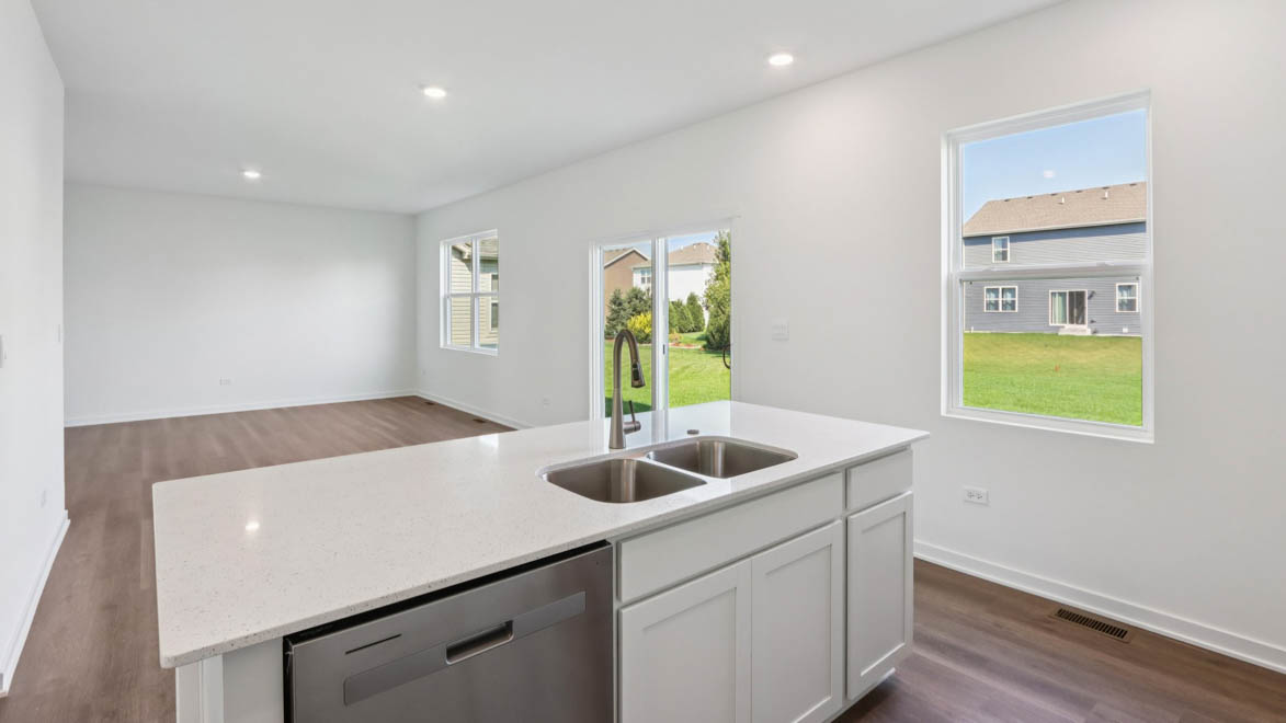 Kitchen island overlooking dining room and great room