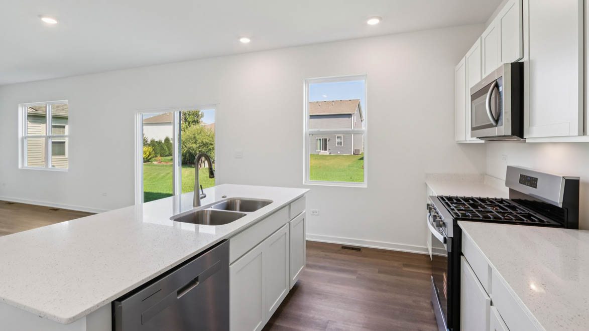 Large kitchen island with sink and dishwasher
