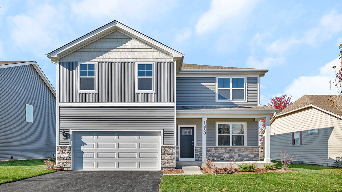 Two story henley model with grey vinyl siding and brick accent