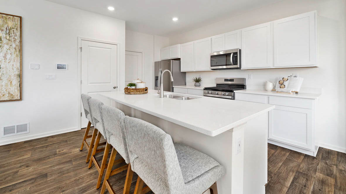Large kitchen island with sink and dishwasher