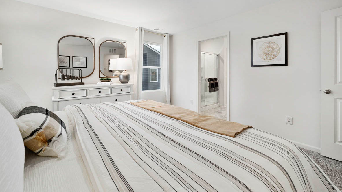 Primary bedroom with connecting en suite