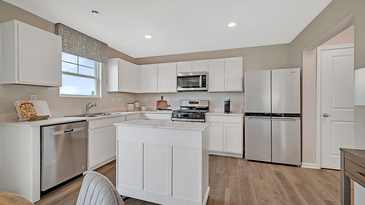 Kitchen white white cabinets and white counters