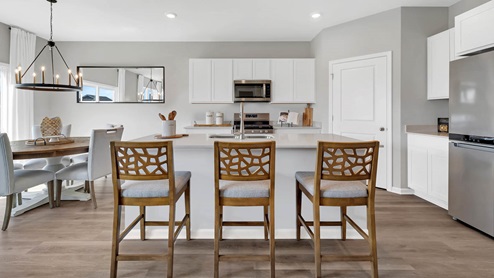 Open concept kitchen area with large kitchen island