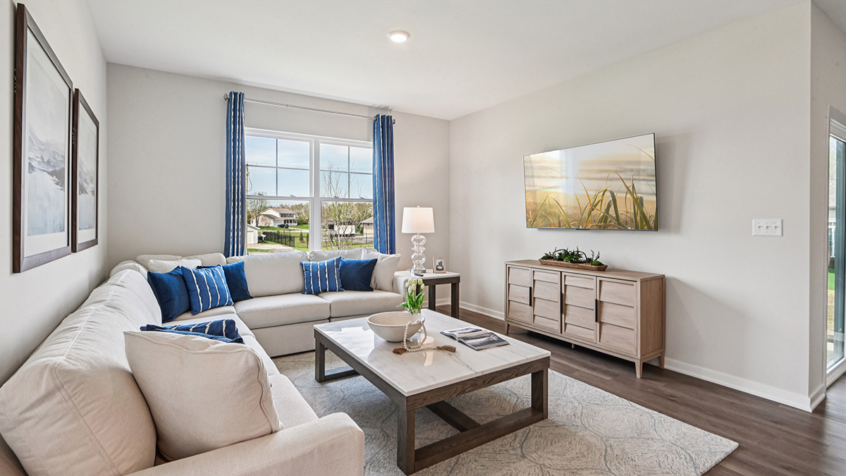 open concept living room overlooking kitchen