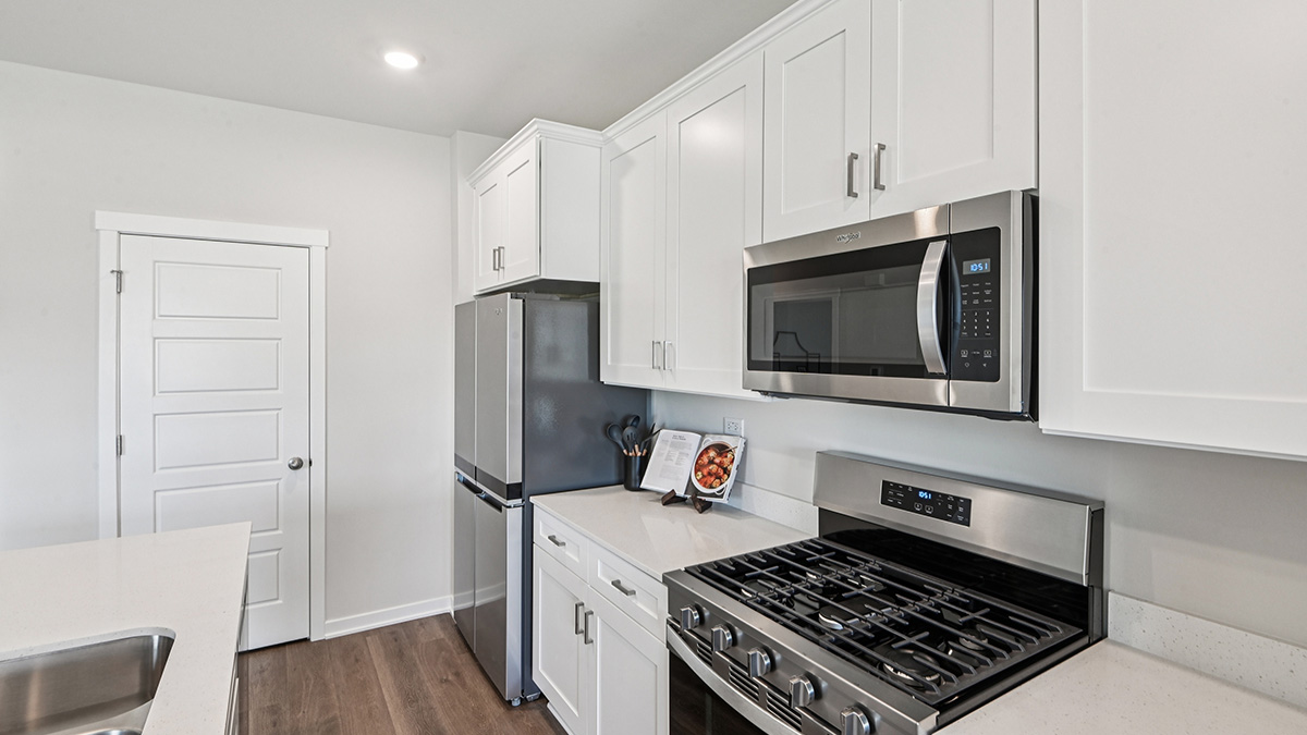 open concept kitchen with stainless steel appliances