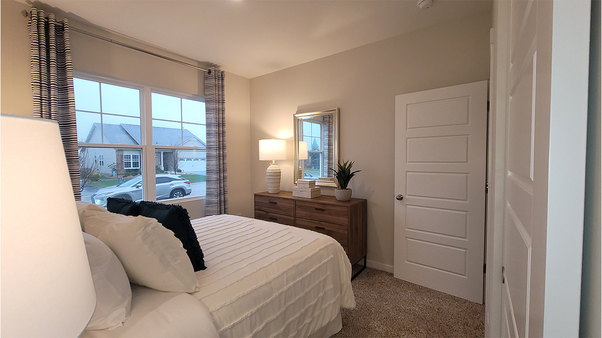 primary bedroom with large windows