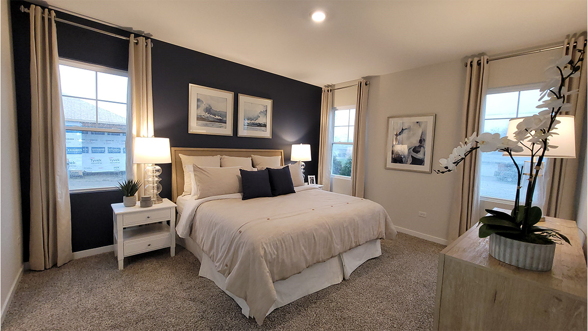 primary bedroom with large windows