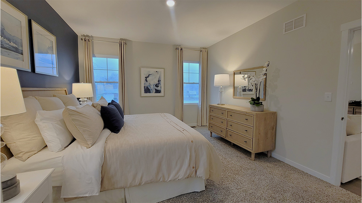 primary bedroom with large windows