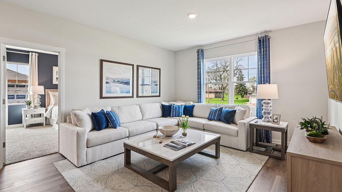open concept living room with vinyl flooring