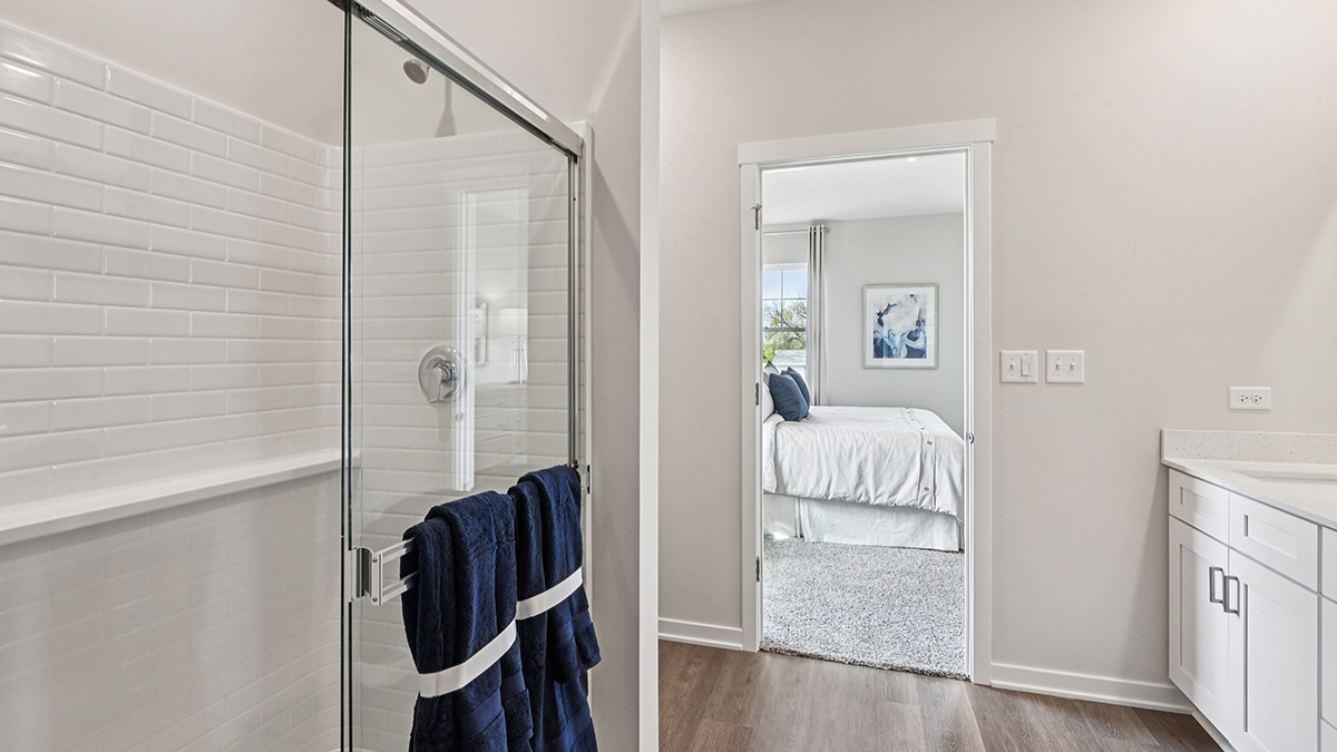primary bathroom with spacious attached closet