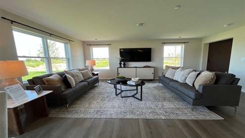 Open concept living room with lots of natural light