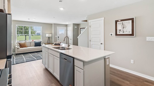 Large kitchen island with sink and dishwasher