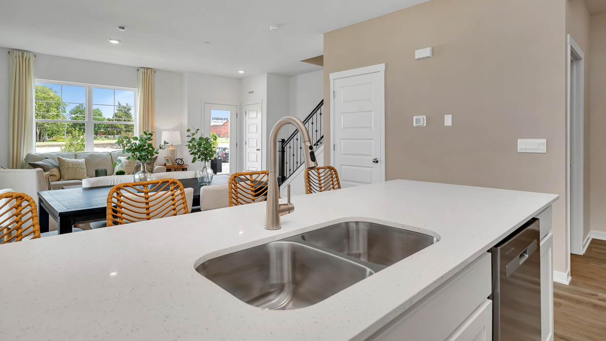 kitchen island overlooking the open concept living room