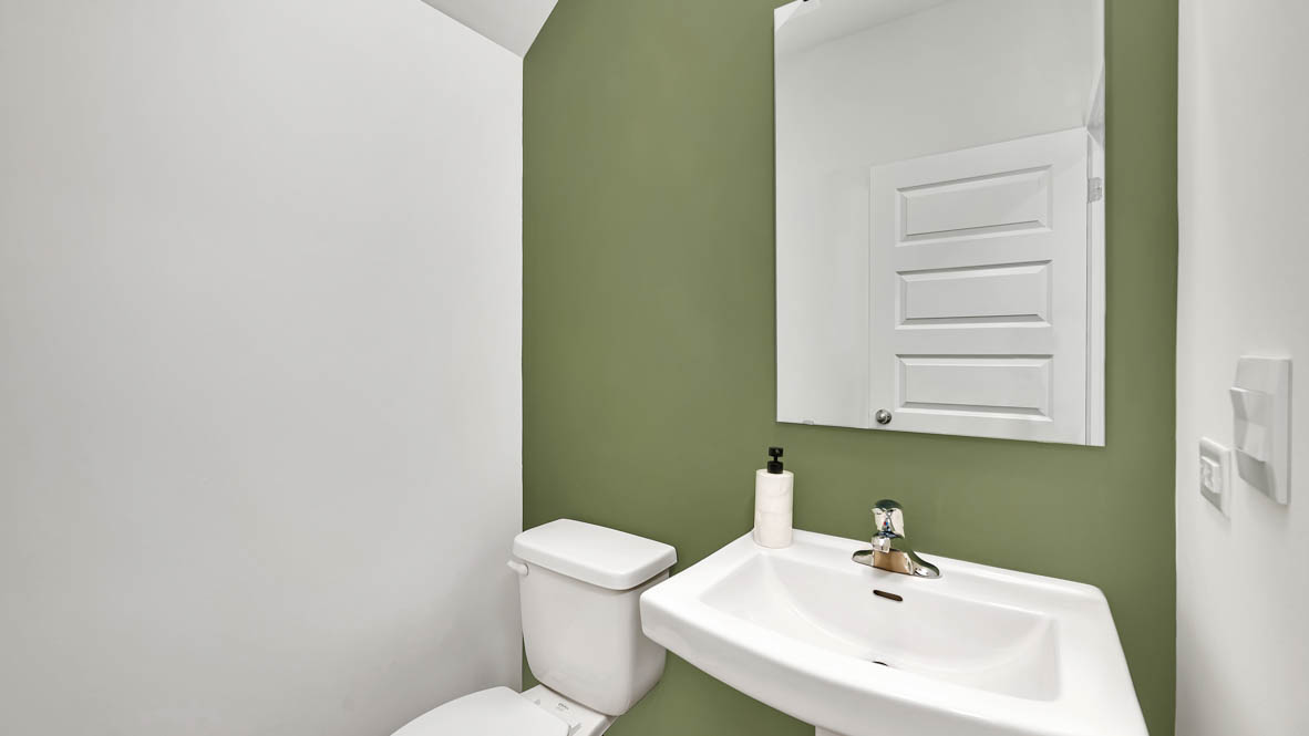 Half bathroom with single bowl vanity