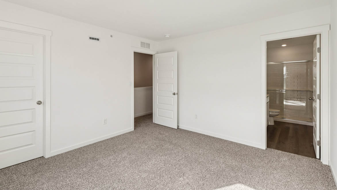 Primary bedroom with connecting ensuite