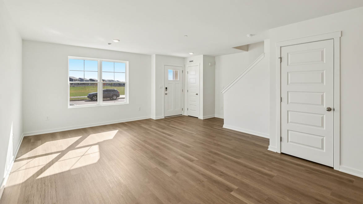 open concept living dining and kitchen area