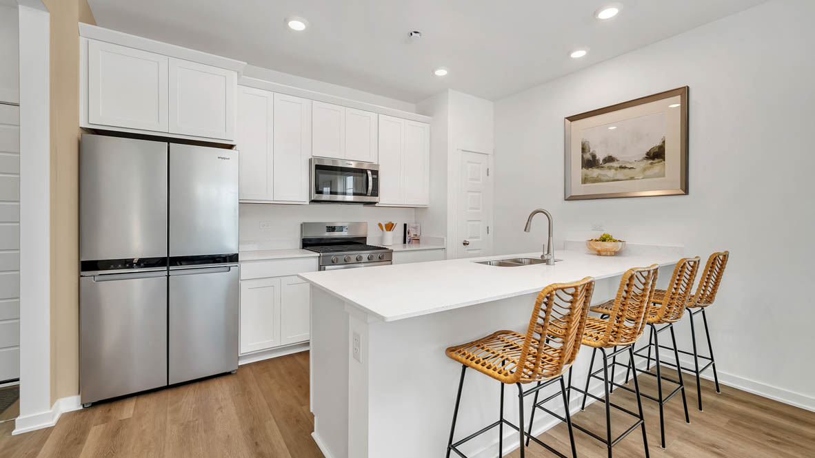 Kitchen with peninsula island from wall